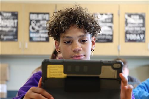 A student works on his iPad