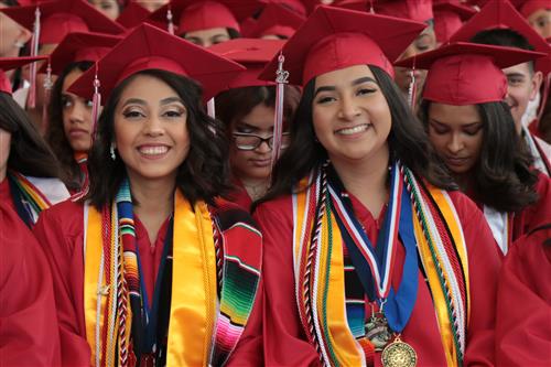 Graduates with cords and sashes