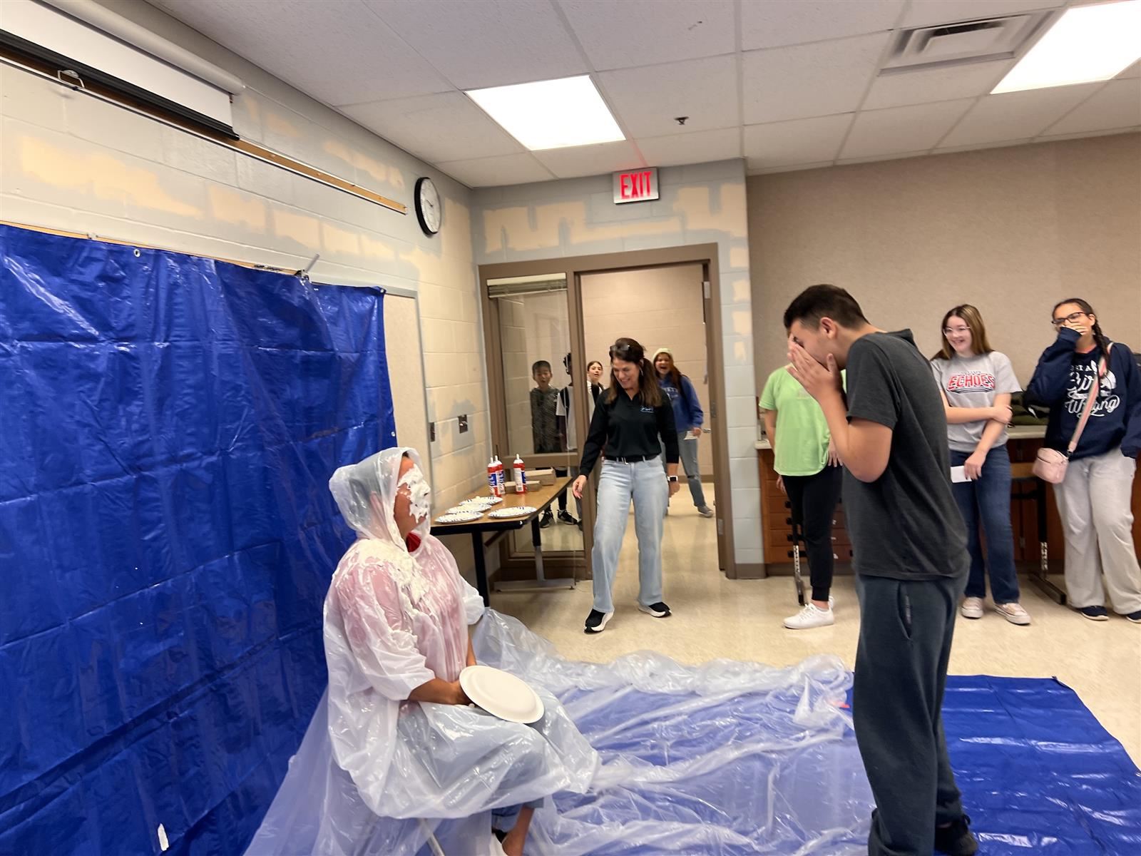  student throws a pie in principal's face