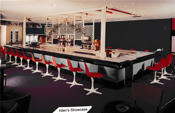 Red chairs surround a square bar inside Allen's Showcase