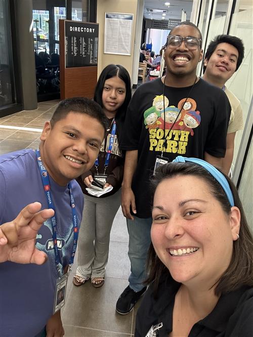 teacher with four students