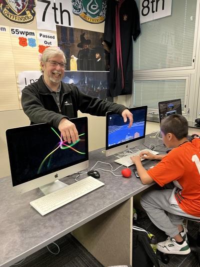 Richard Gottner works with a student