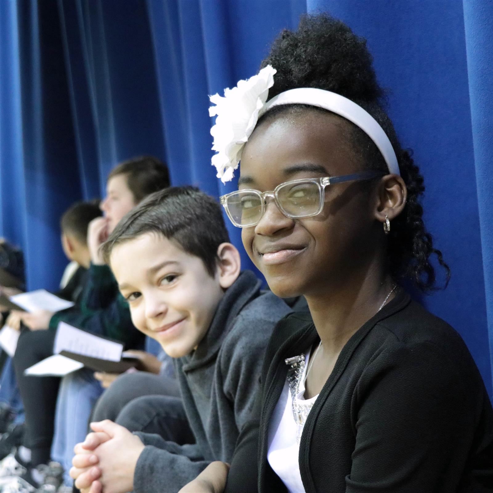  Students smile at the camera